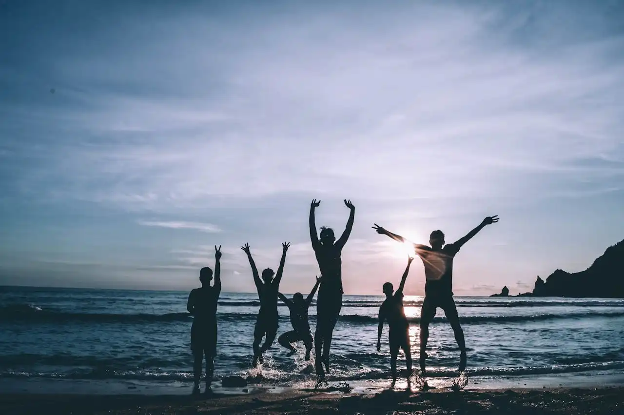 Silhouette of a family on the beach